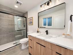 Modern Kent 3BR/2BA Retreat | Kitchen & Laundry - Image 4