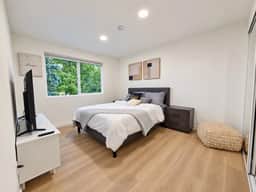 Modern Kent 3BR/2BA Retreat | Kitchen & Laundry - Image 5